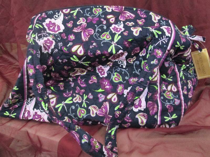 Large purple floral duffle clothes ...