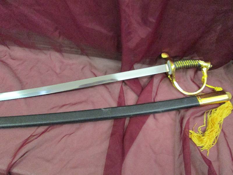 Long Black and Gold Color Handle Sw...