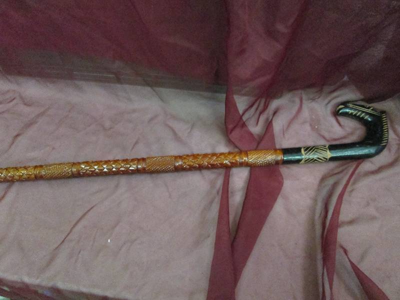 Black Handle Brown Carved Wooden Ca...