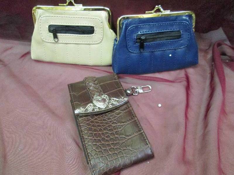 one blue change purse, one beige ch...