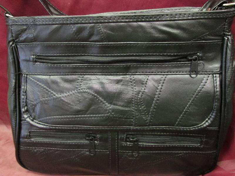 Black purse wit shoulder strap...