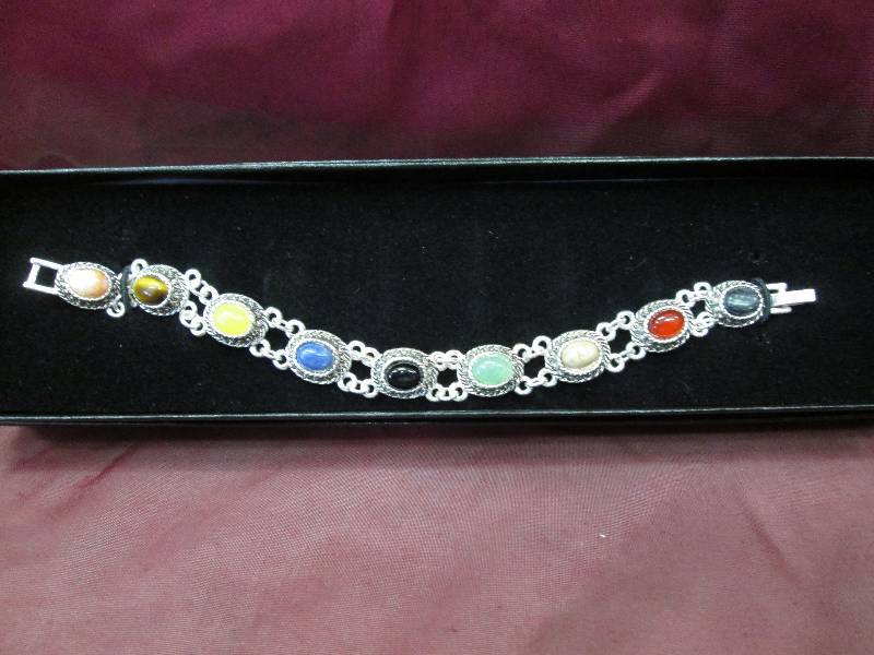 Multi color stone  silver tone brac...