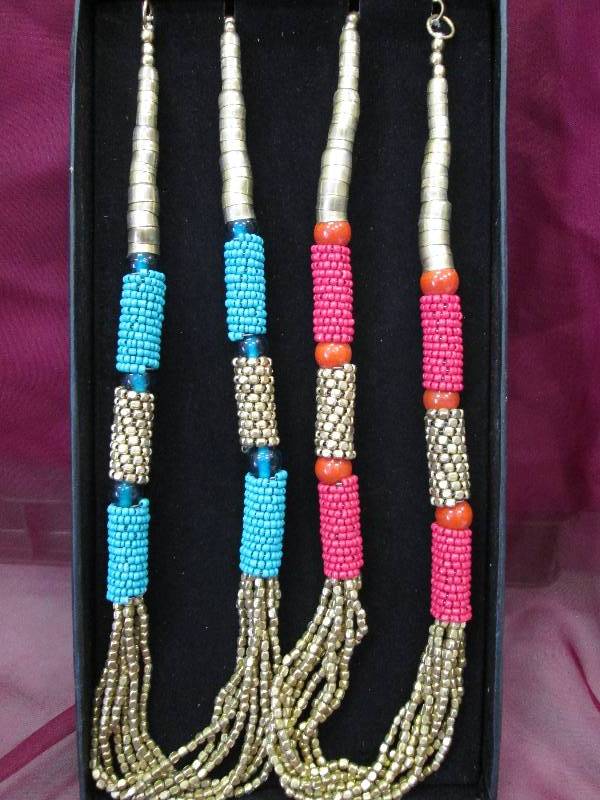 2 piece set necklaces  1-red and go...