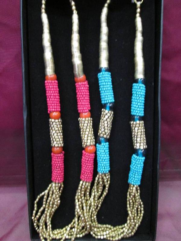 2 piece set necklaces  1- red and g...