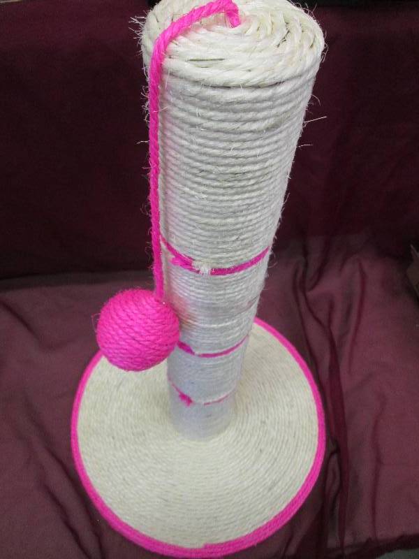 pink and tan cat cratching post...
