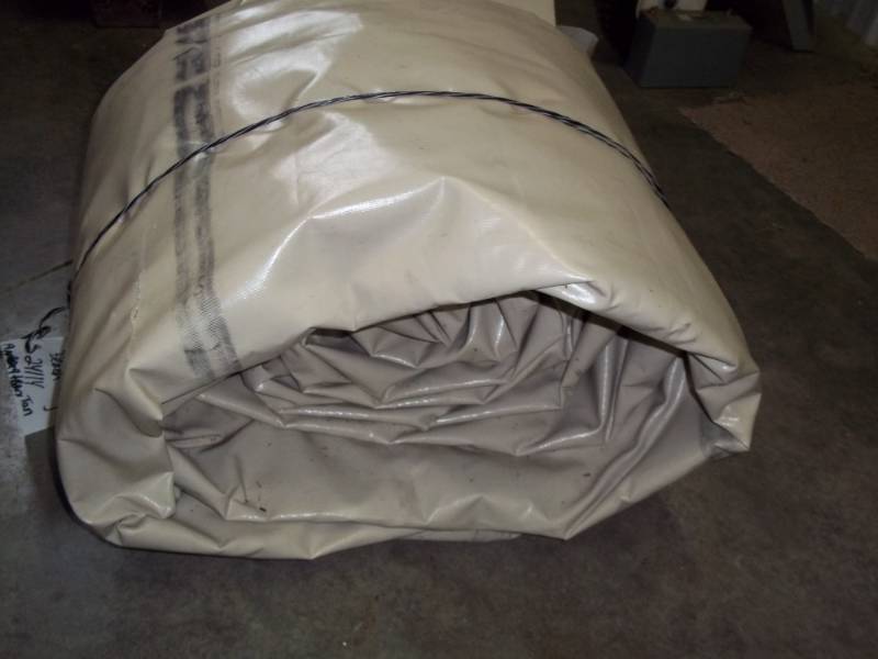 lot 74 image: 24 tarp by 114 wide good for wood pile may have some holes or rips