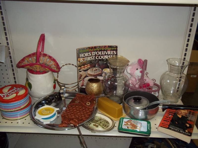 lot 114 image: Kitchen Utensils, cookbook, Nancy Grace book, and misc dcor