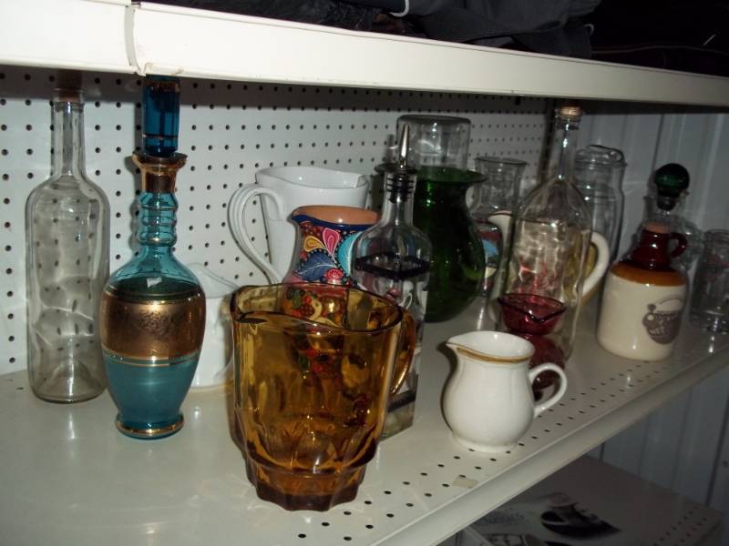 lot 142 image: Glassware with bottles and green pitcher with milk jar