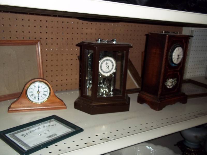 lot 143 image: Clocks with picture frames