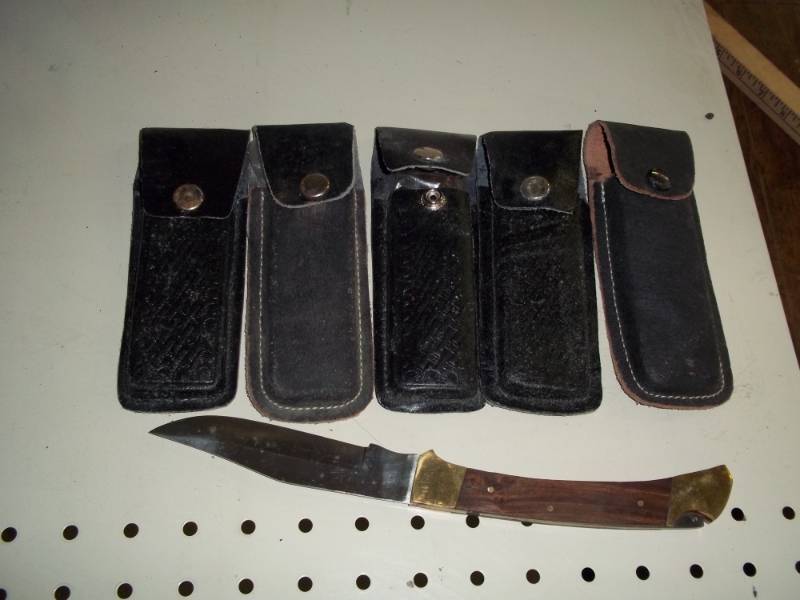 lot 177 image: 5 lock back knives with leather sheath