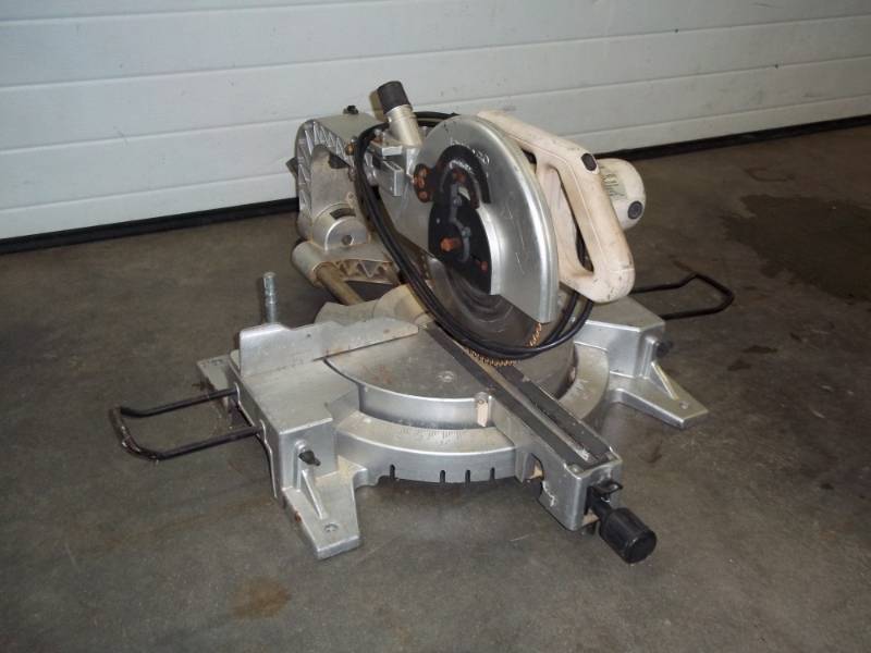 lot 212 image: 12 Compound Slide Miter Saw with laser tested and works