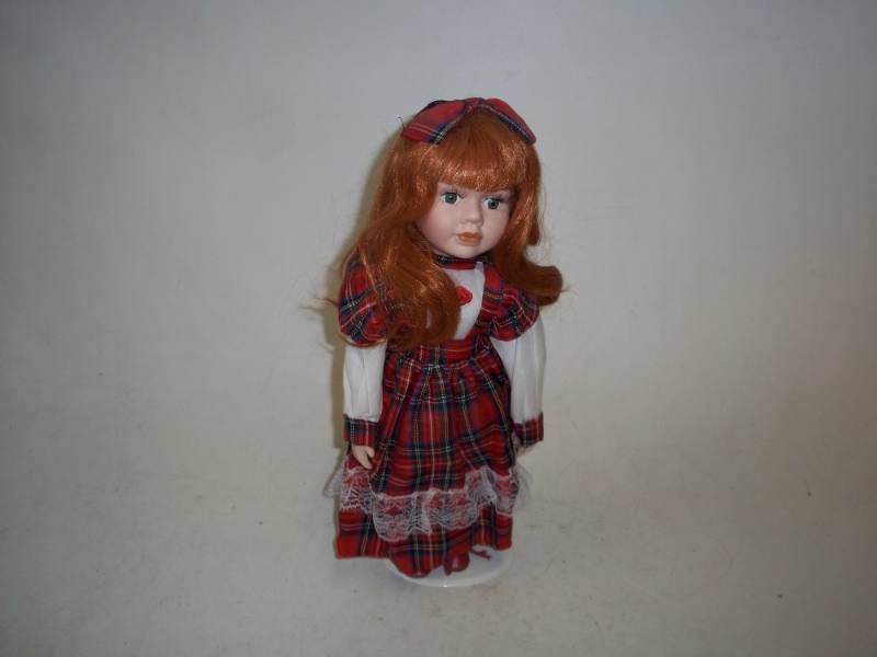 lot 237 image: 15 in Porcelain Doll with Stand