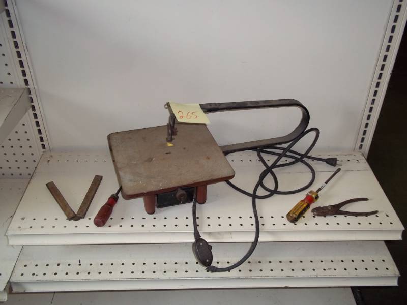 lot 265 image: Syncro Saw with tools