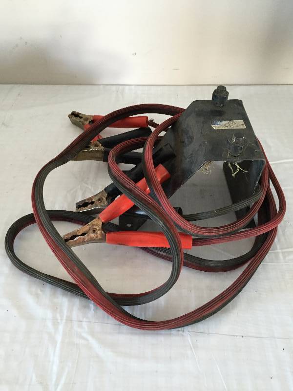 SPARE TIRE CARRIER AND JUMPER CABLES