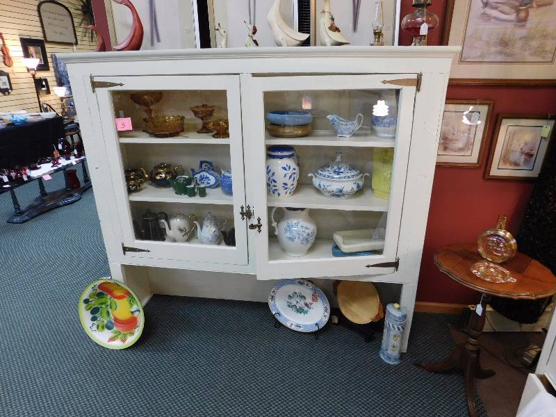 Upper half of a hutch removed from a home during renovation.
