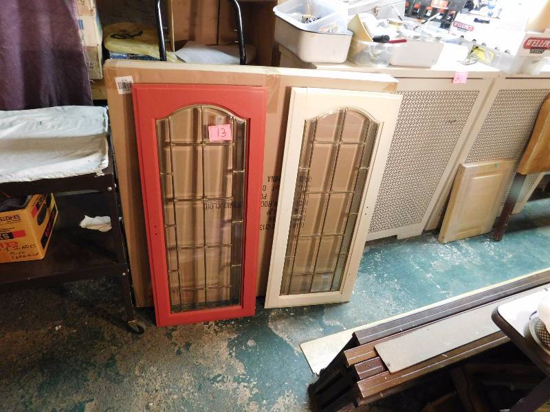 Two lead glass beveled windows both are painted.