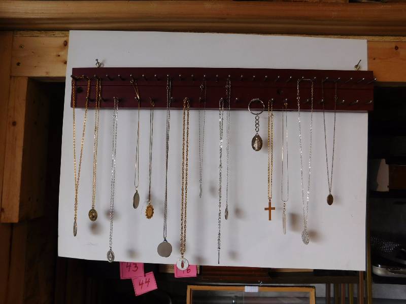 large lot of religious necklaces...FYI... the display is NOT included