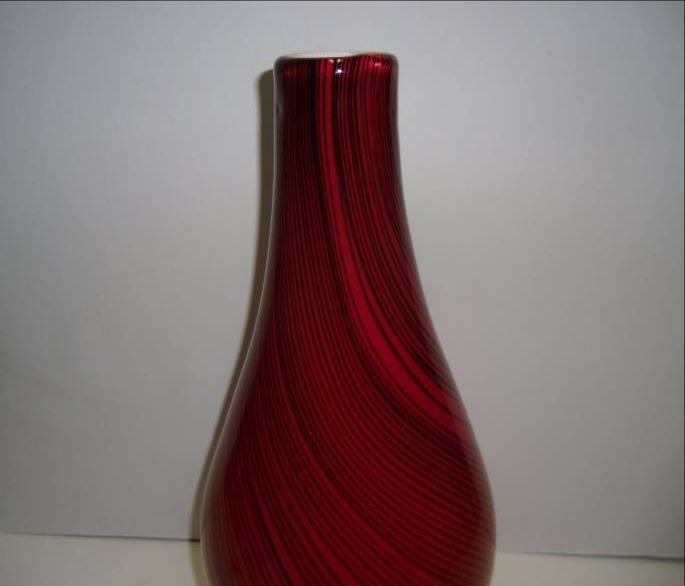 lot 19 image: Spectacular Red Vase and Candle Holders