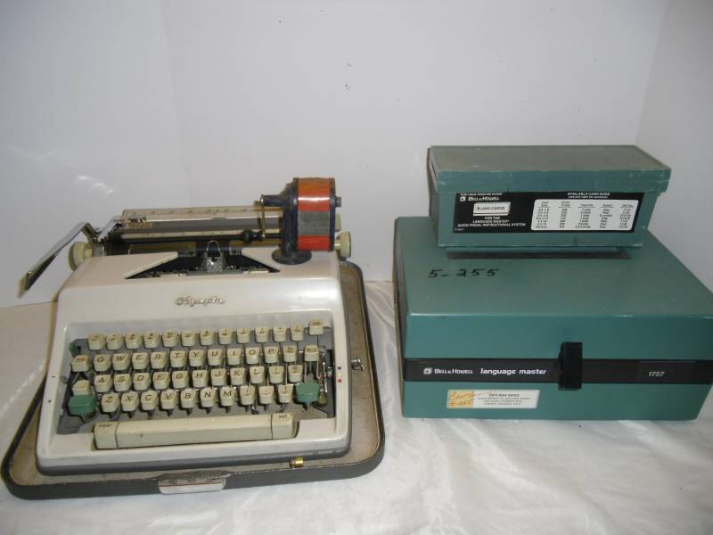 lot 16 image: Old Portable Typewriter and Bell l& Howell Language Master