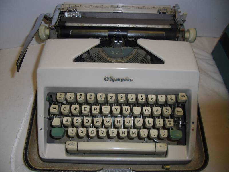 Old Portable Typewriter and Bell l& Howell Language Master | End 