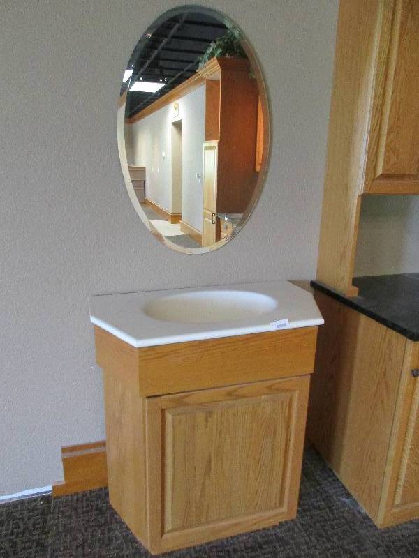 lot 101 image: Bathroom vanity and mirror