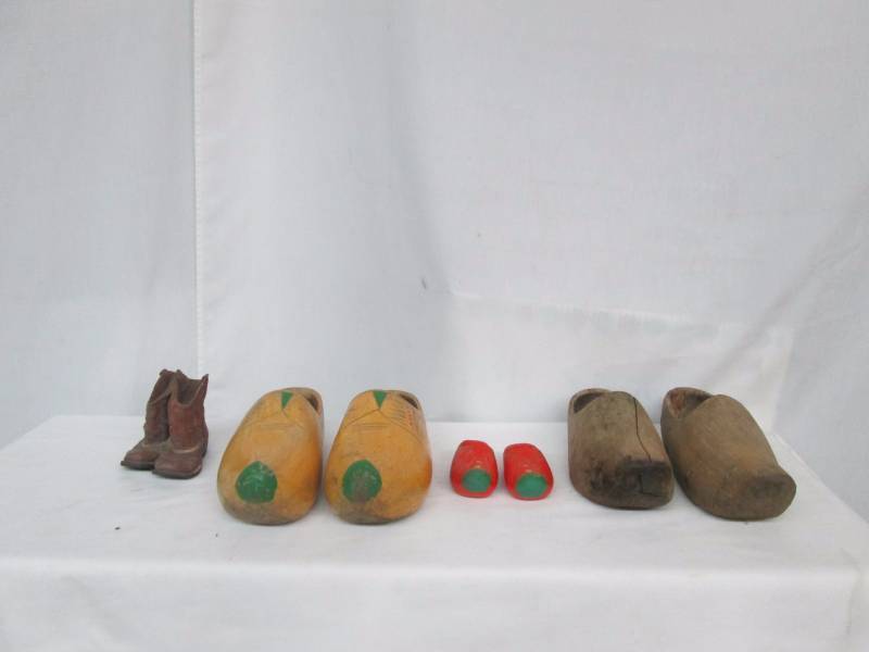 Pairs of Clogs and a Statue