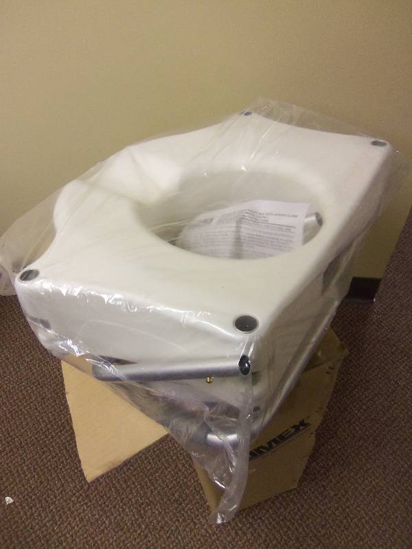 Lumex Raised Toilet Seat With Locking Clamp
