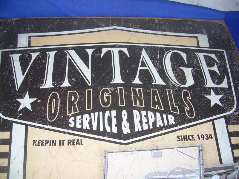 vintage and originals service and repair sign
