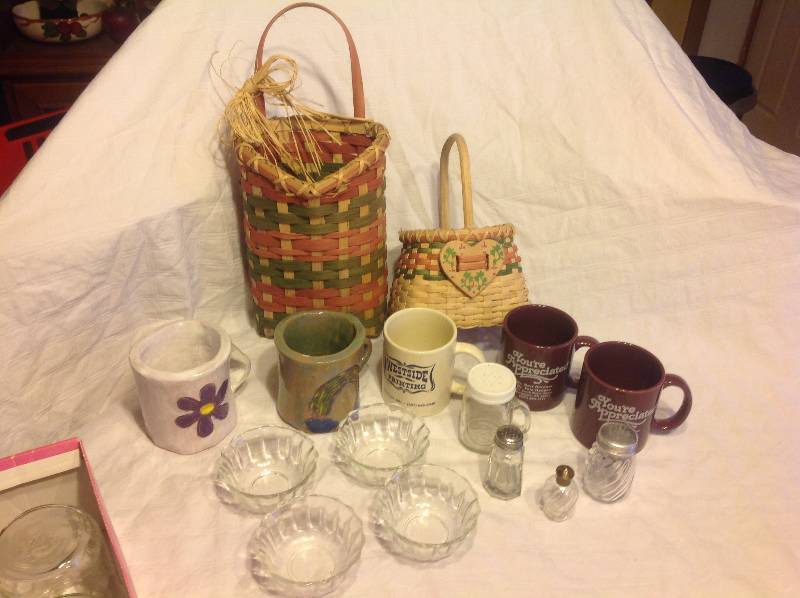 Baskets, hand made coffee cups, salt & pepper shakers & glass pudding cups.