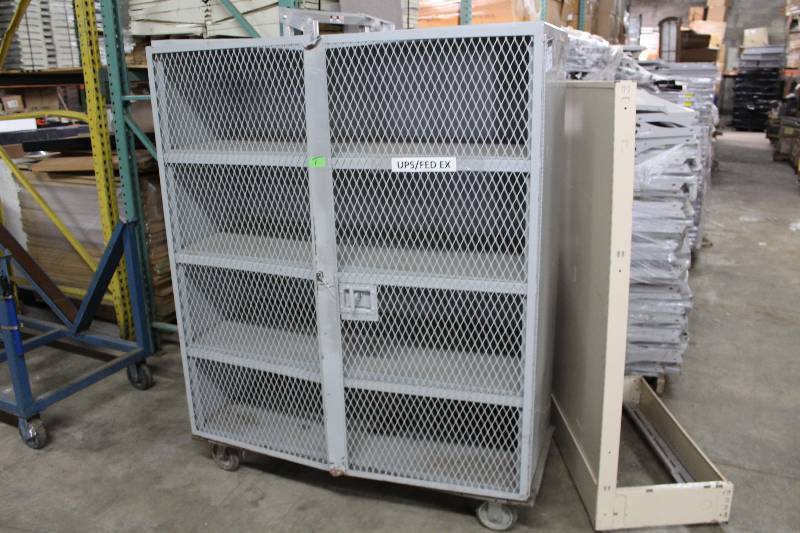 lot 11 image: Cabinet wShelves & Wheels Metal Grate Doors 10 Shelves 23 x 53 x 62.5.