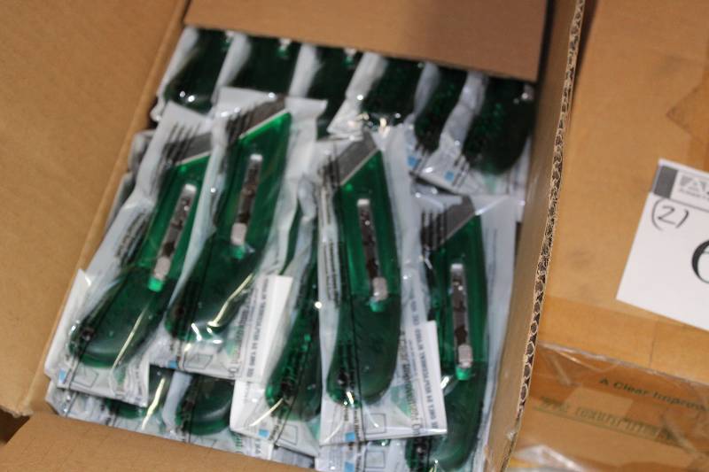 lot 64 image: Box Lot of (1) s4 Box Cutters Right-Handed app. 72 ct perBox.