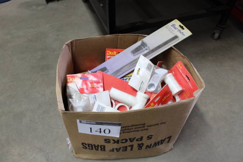 lot 140 image: Box Lot Including Do It PVC Tees, Adapters Paint Roller Cleaner Towel Rack And More.