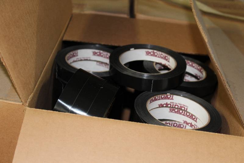 lot 173 image: Box Lot of (6) TaraTape Mopp Strapping Black 96 rollsBox .71 x 60.1 Yards.
