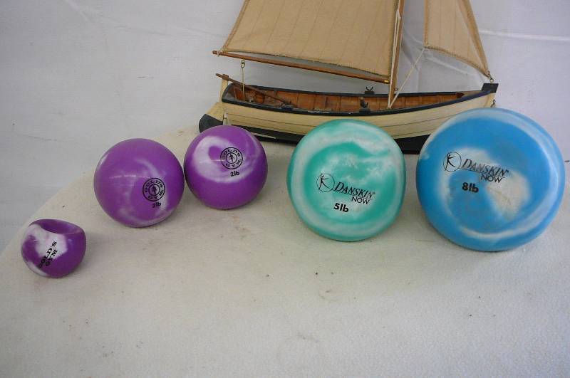 lot 41 image: Exercise Balls and Decorative wooden boat