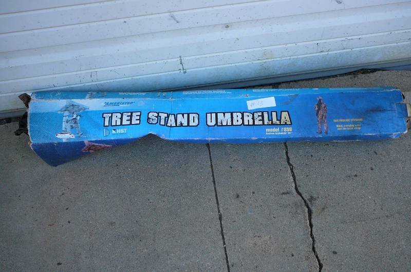 lot 13 image: Tree Stand Umbrella Model 856 Reel Tree Hardwood