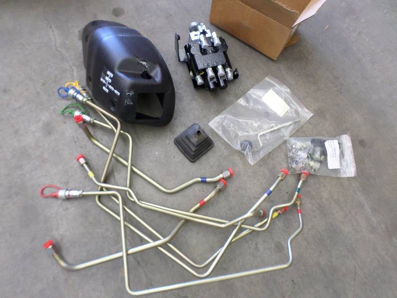 lot 19 image: Unused Tractor Loader Control With ...