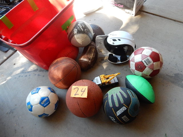 lot 24 image: Balls, Baseball helmet, Soccer and Basketballs
