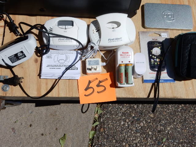 lot 55 image: 2 First Alert smokecarbon Monoxide detectors, Battery charger other items