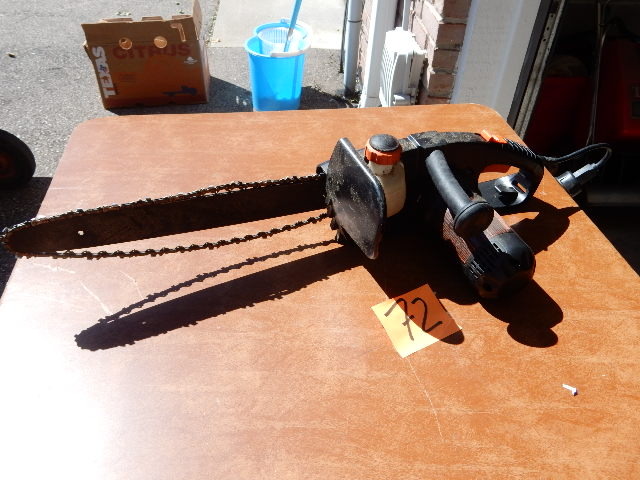 lot 72 image: Remington 3.0 HP Electric Chain Saw