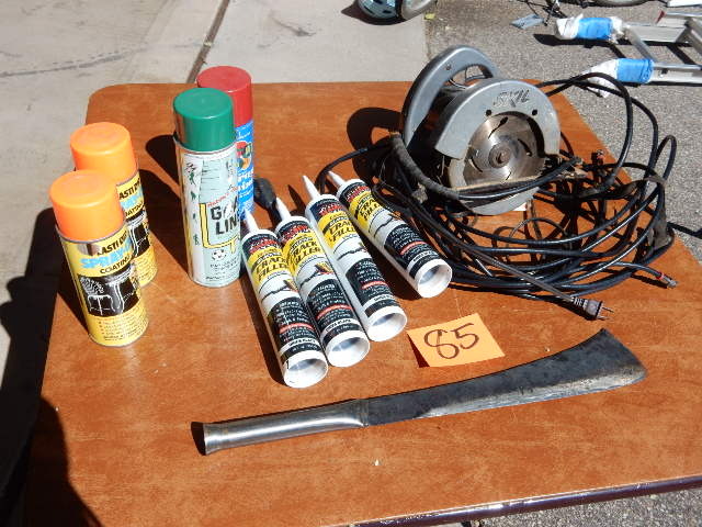lot 85 image: 6 in Skil Saw.. Spray paint, Crack Filler, Machette, Coaxil Cable