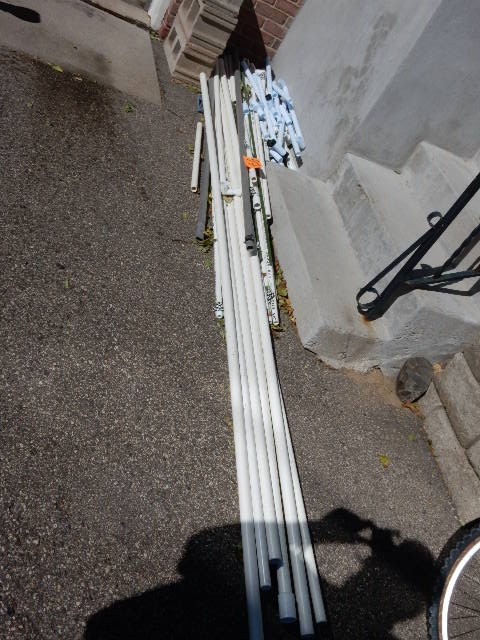 lot 97 image: Lot of PVC pipe..3 Cinder Blocks