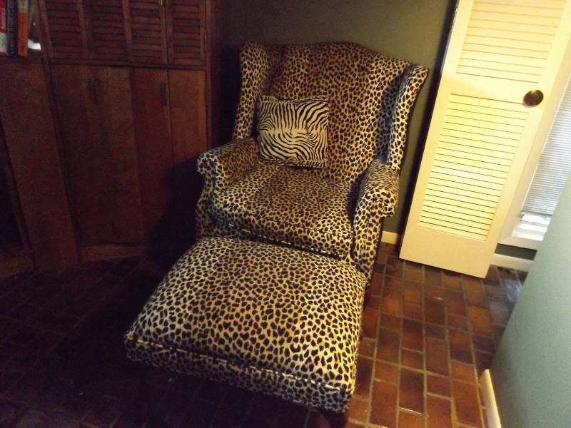 lot 62 image: Leopard Print Wing Chair with Ottoman