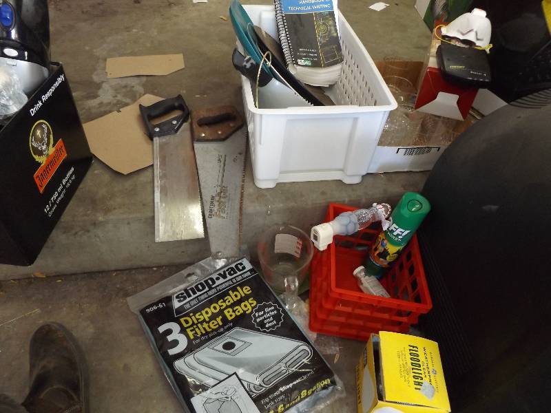 lot 249 image: Saws, Pyrex Measuring Cup, Pliers, Cutter, more
