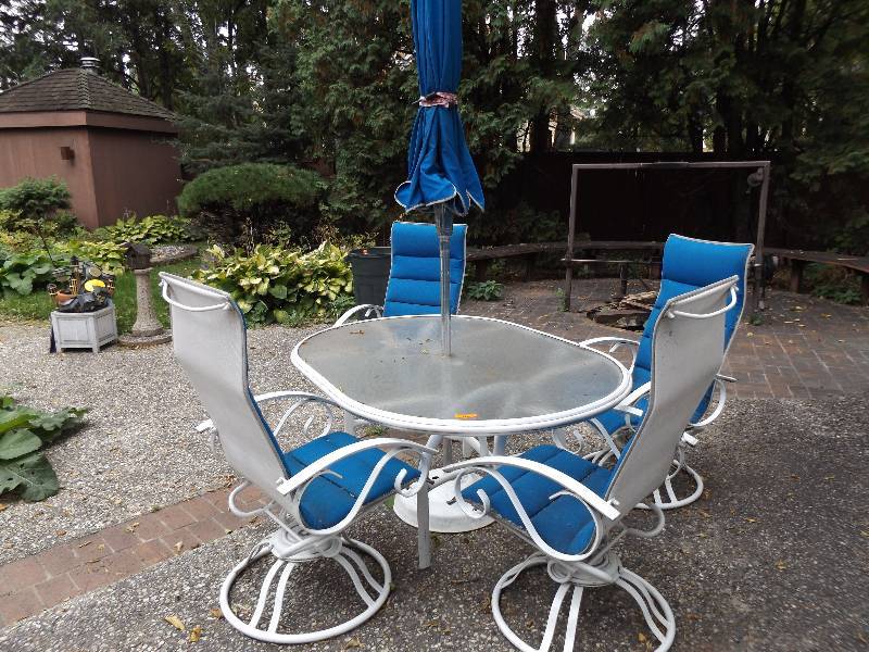 lot 597 image: Glass Table, Chairs, Umbrella