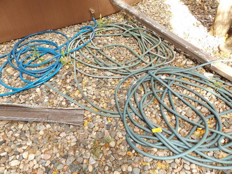 lot 551 image: 3 Garden Hoses