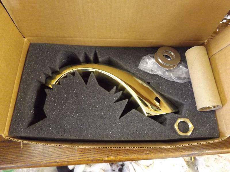 lot 500 image: Gold Colored Faucet