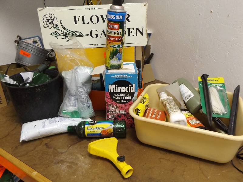 lot 324 image: Plant Food, Mosquito Spray, Small Plastic Tub,