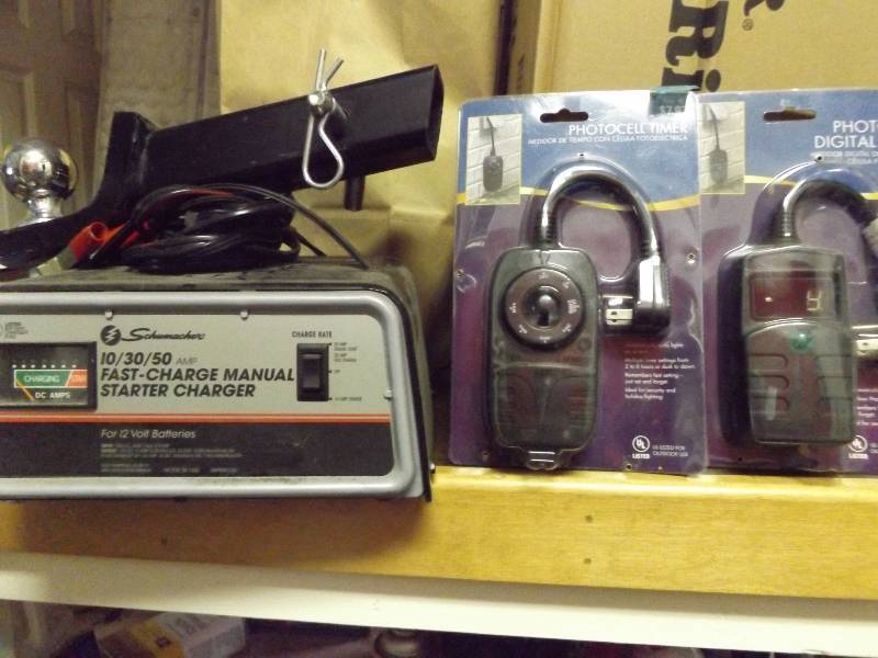 lot 230 image: Battery Charger and Candle