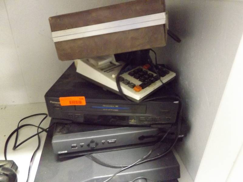 lot 538 image: Typewriter, Panasonic DVD Player, Tape Box, RCA DSS