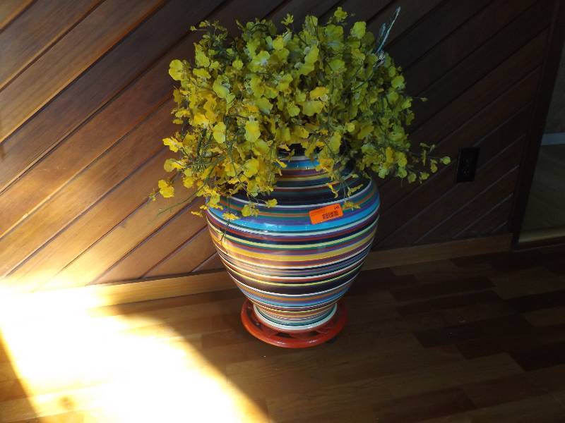 lot 130 image: Vase on Rolling Base